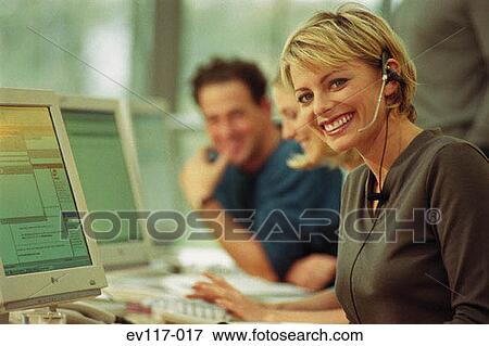 Stock Photo - Woman in call centre. Fotosearch