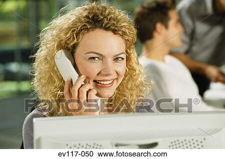 Stock Image - Woman on phone. Fotosearch