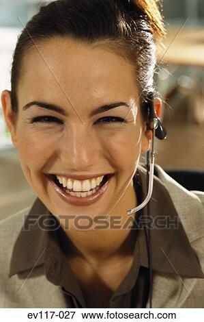 Stock Photo - Woman with headset. Fotosearch