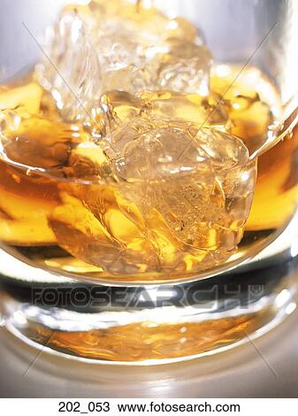 Whiskey on the rocks View Large Photo Image Stock Image - Whiskey on the rocks. Fotosearch