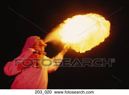 Stock Image - Fire-eater. Fotosearch