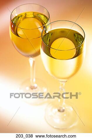 Stock Photo - Glasses of white wine. Fotosearch