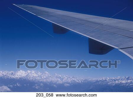 Wing of an aeroplane View Large Photo Image Stock Photo - Wing of an aeroplane. Fotosearch