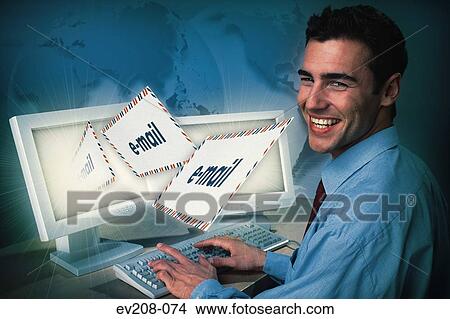 Man sending e-mails View Large Photo Image Picture - Man sending e-mails. Fotosearch