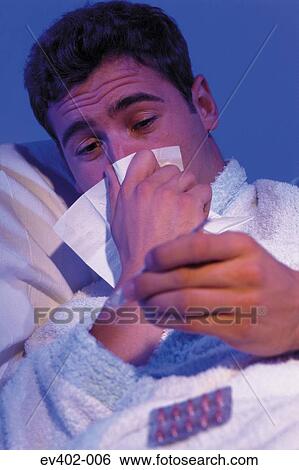 Stock Photograph - Man with flu. Fotosearch