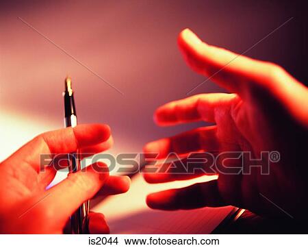 Hands and pen View Large Photo Image Picture - Hands and pen. Fotosearch