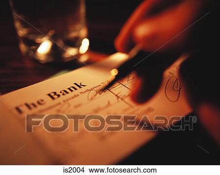 Writing cheque View Large Photo Image Picture - Writing cheque. Fotosearch