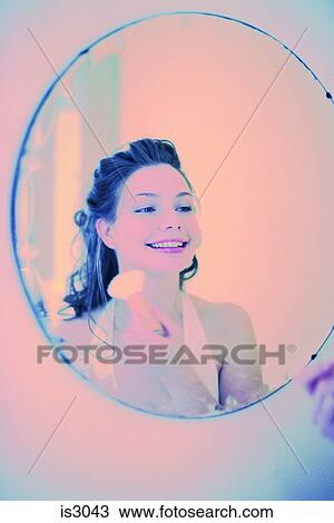 Woman in mirror View Large Photo Image Stock Image - Woman in mirror. Fotosearch