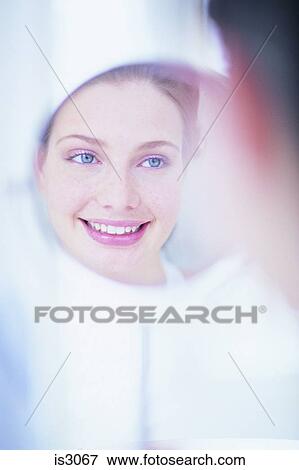 Woman in mirror View Large Photo Image Stock Photo - Woman in mirror. Fotosearch