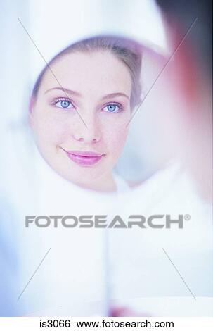 Woman in mirror View Large Photo Image Stock Photograph - Woman in mirror. Fotosearch