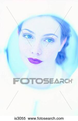 Stock Photography - Woman in mirror. Fotosearch