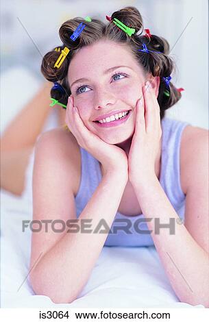 Woman with hairclips View Large Photo Image Picture - Woman with hairclips. Fotosearch