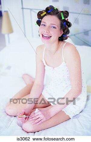 Woman with hairclips View Large Photo Image Stock Image - Woman with hairclips. Fotosearch
