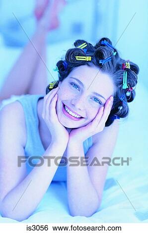 Woman with hairclips View Large Photo Image Stock Photograph - Woman with hairclips. Fotosearch