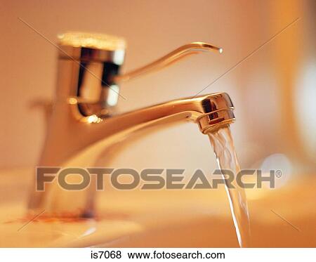 Running tap View Large Photo Image Stock Photo - Running tap. Fotosearch