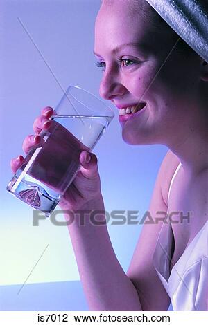 Woman drinking water View Large Photo Image Stock Image - Woman drinking water. Fotosearch
