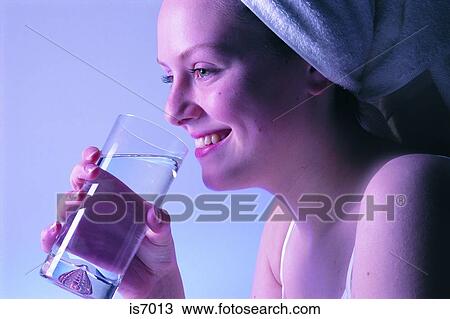 Woman drinking water View Large Photo Image Stock Image - Woman drinking water. Fotosearch