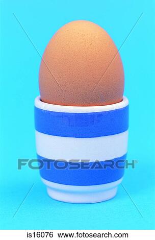 Egg and cup View Large Photo Image Stock Photograph - Egg and cup. Fotosearch