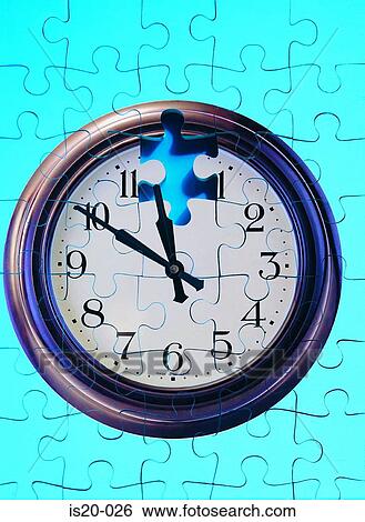Stock Photograph - Clock and jigsaw. Fotosearch