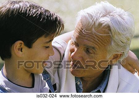 Picture - Mature man and boy. Fotosearch