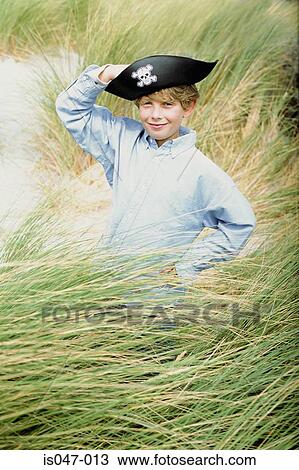 Boy wearing a pirate hat View Large Photo Image Stock Image - Boy wearing a pirate hat. Fotosearch