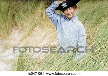 Boy wearing a pirate hat View Large Photo Image Stock Image - Boy wearing a pirate hat. Fotosearch