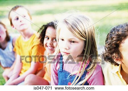 Friends in a park View Large Photo Image Stock Image - Friends in a park. Fotosearch
