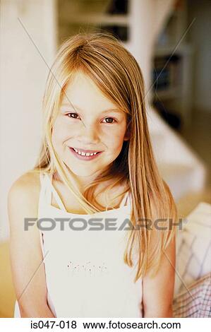 Stock Photo - Girl grinning. Fotosearch