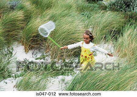 Girl with a butterfly net View Large Photo Image Stock Image - Girl with a butterfly net . Fotosearch