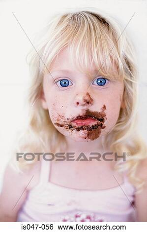 Girl with chocolate on her face View Large Photo Image Stock Photograph - Girl with chocolate on her face. Fotosearch