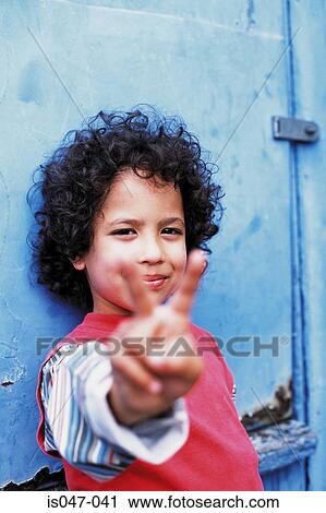 Portrait of a boy looking cool View Large Photo Image Stock Image - Portrait of a boy looking cool. Fotosearch