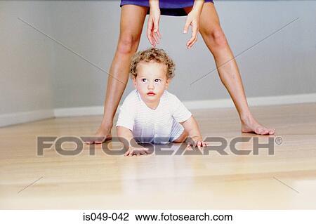 Stock Image - Baby crawling. Fotosearch