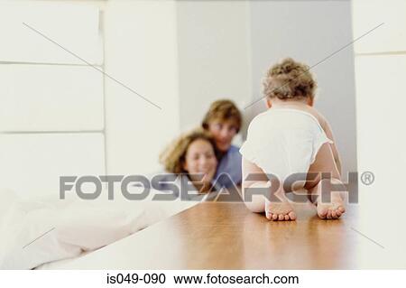Stock Image - Baby crawling. Fotosearch