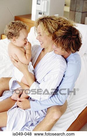 Stock Photo - Family having fun. Fotosearch
