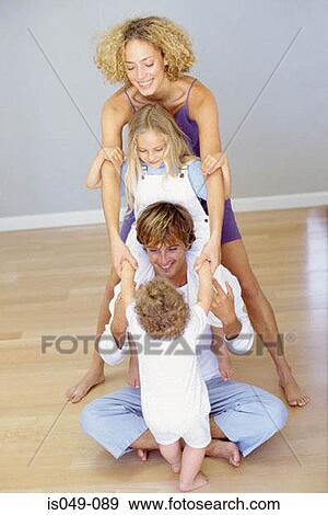Family having fun View Large Photo Image Stock Photo - Family having fun. Fotosearch