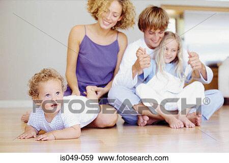Family playing together View Large Photo Image Stock Photo - Family playing together. Fotosearch