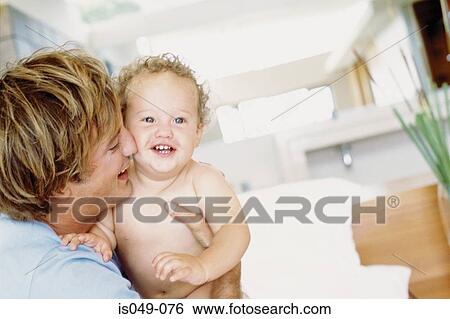 Father and baby having fun View Large Photo Image Stock Photograph - Father and baby having fun. Fotosearch