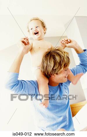 Father giving a piggyback View Large Photo Image Stock Image - Father giving a piggyback. Fotosearch