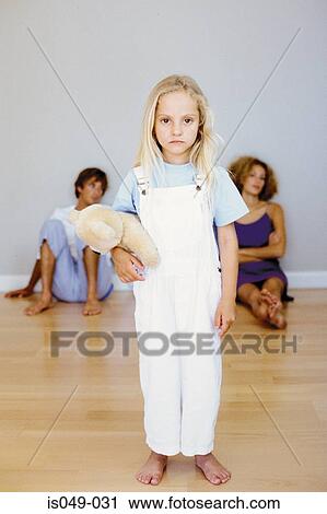 Stock Image - Girl with teddy bear. Fotosearch