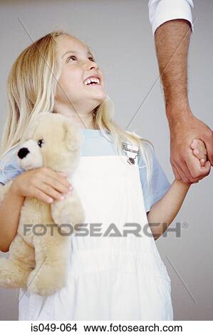 Happy girl with teddy bear View Large Photo Image Picture - Happy girl with teddy bear. Fotosearch