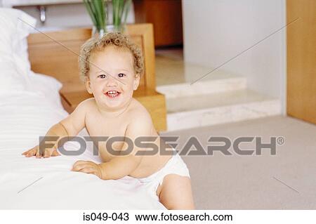 Stock Image - Smiling baby . Fotosearch