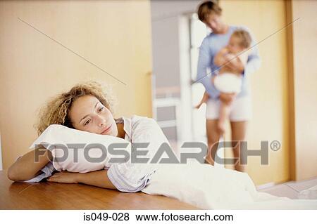 Tired mother View Large Photo Image Stock Photo - Tired mother. Fotosearch