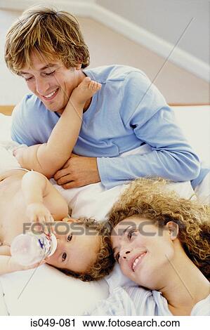 Young couple with baby View Large Photo Image Stock Image - Young couple with baby . Fotosearch