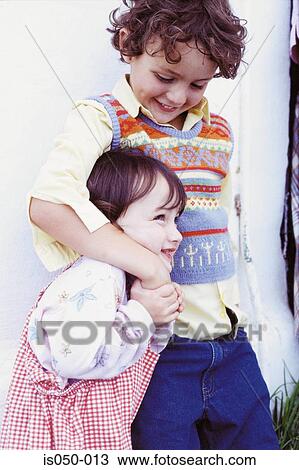 Brother and sister playing View Large Photo Image Stock Image - Brother and sister playing. Fotosearch