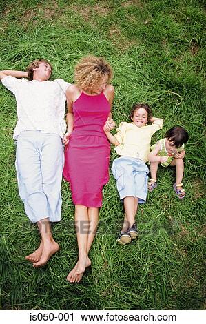 Family day out in a park View Large Photo Image Stock Image - Family day out in a park . Fotosearch