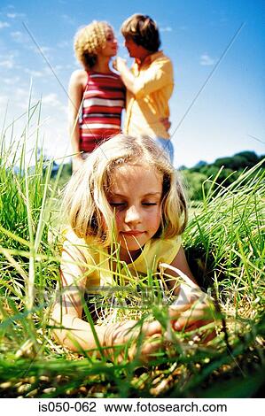 Girl in a field View Large Photo Image Stock Image - Girl in a field. Fotosearch