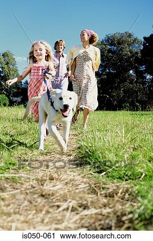 Girl walking dog in the country View Large Photo Image Stock Image - Girl walking dog in the country . Fotosearch