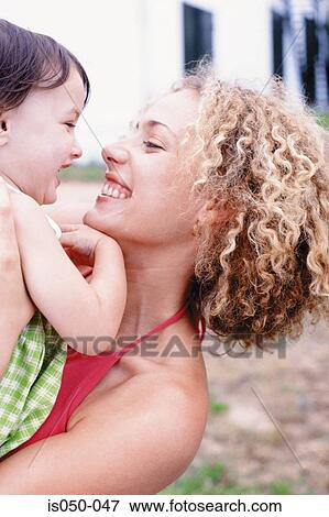 Mother and daughter having fun View Large Photo Image Stock Photo - Mother and daughter having fun. Fotosearch