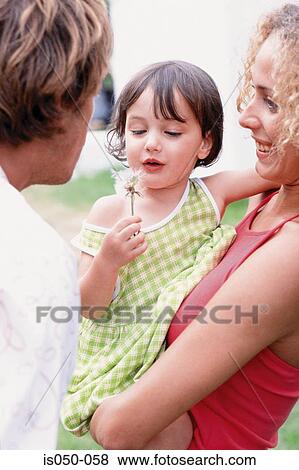 Mother holding daughter View Large Photo Image Stock Photo - Mother holding daughter. Fotosearch