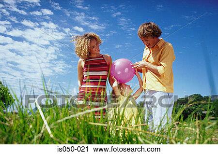 Parents playing with daughter View Large Photo Image Stock Image - Parents playing with daughter. Fotosearch